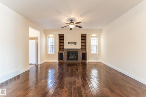 5512 Conestoga, Edmonton, AB - Indoor Photo Showing Living Room With Fireplace