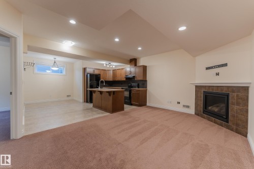 5512 Conestoga, Edmonton, AB - Indoor Photo Showing Living Room With Fireplace
