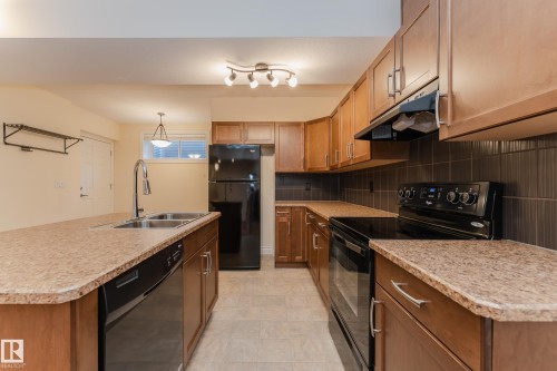 5512 Conestoga, Edmonton, AB - Indoor Photo Showing Kitchen With Double Sink