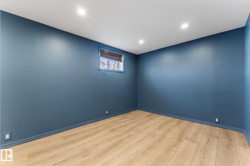 This room features wood-style flooring, a window, and recessed lighting - 2626 49 Street, Edmonton, AB - Indoor Photo Showing Other Room