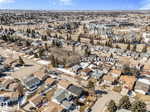 Aerial view of the property and its surrounding neighbourhood, featuring established residential streets and mature trees - 2626 49 Street, Edmonton, AB - Outdoor With View