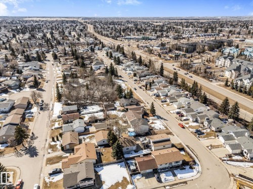 Aerial view of the neighborhood showcasing residential streets, detached properties, and mature trees - 2626 49 Street, Edmonton, AB - Outdoor With View
