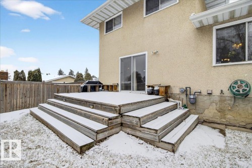The property features a tiered wooden deck with integrated lighting - 391 Lee Ridge Road, Edmonton, AB - Outdoor With Exterior