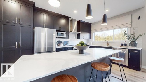20707 40 Avenue, Edmonton, AB - Indoor Photo Showing Kitchen With Upgraded Kitchen