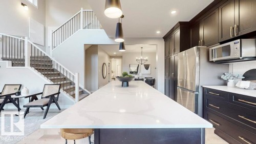 20707 40 Avenue, Edmonton, AB - Indoor Photo Showing Kitchen With Upgraded Kitchen