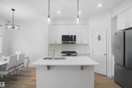 7216 182 Avenue, Edmonton, AB - Indoor Photo Showing Kitchen With Double Sink With Upgraded Kitchen