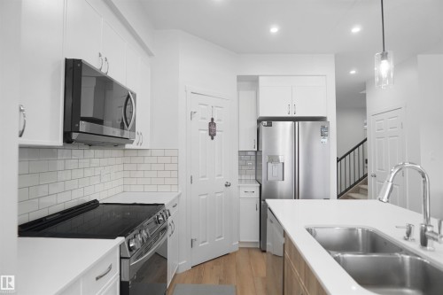 7216 182 Avenue, Edmonton, AB - Indoor Photo Showing Kitchen With Double Sink
