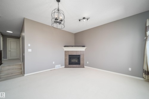 5935 6 Avenue, Edmonton, AB - Indoor With Fireplace