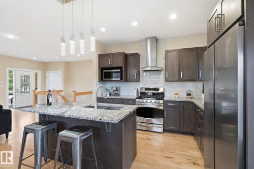8704 75 Avenue, Edmonton, AB - Indoor Photo Showing Kitchen With Double Sink With Upgraded Kitchen