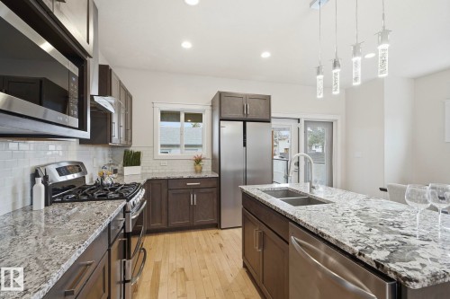 8704 75 Avenue, Edmonton, AB - Indoor Photo Showing Kitchen With Double Sink With Upgraded Kitchen