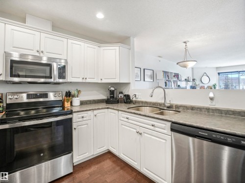401 12110 106 Avenue, Edmonton, AB - Indoor Photo Showing Kitchen With Stainless Steel Kitchen With Double Sink