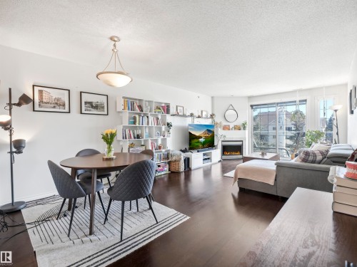 401 12110 106 Avenue, Edmonton, AB - Indoor Photo Showing Other Room With Fireplace