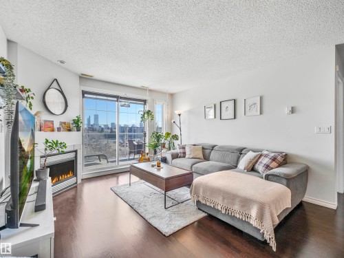 401 12110 106 Avenue, Edmonton, AB - Indoor Photo Showing Living Room With Fireplace