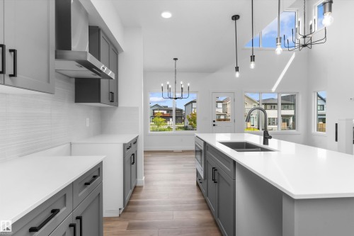 5005 Cawsey Link Sw, Edmonton, AB - Indoor Photo Showing Kitchen With Double Sink With Upgraded Kitchen