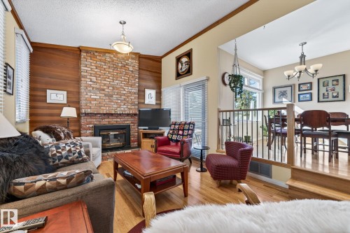 11715 28 Avenue, Edmonton, AB - Indoor Photo Showing Living Room With Fireplace