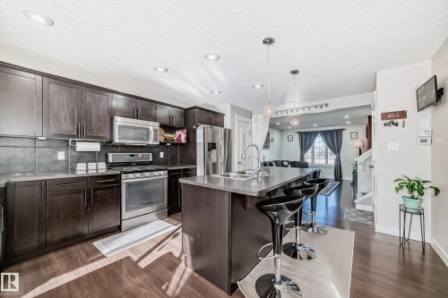 5920 Rue Eaglemont, Beaumont, AB - Indoor Photo Showing Kitchen With Stainless Steel Kitchen With Double Sink With Upgraded Kitchen