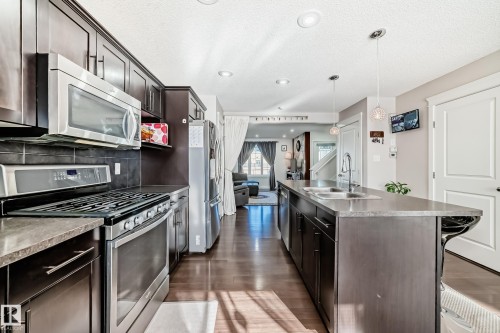 5920 Rue Eaglemont, Beaumont, AB - Indoor Photo Showing Kitchen With Stainless Steel Kitchen With Double Sink With Upgraded Kitchen