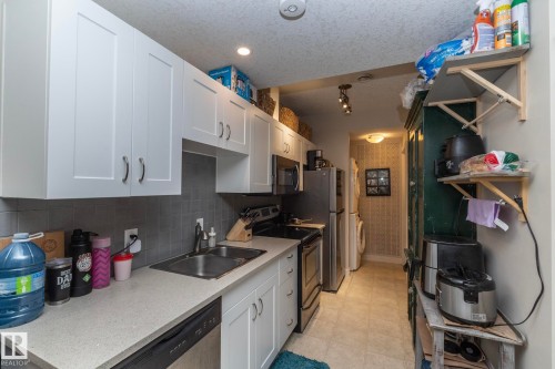 5315 17 Avenue, Edmonton, AB - Indoor Photo Showing Kitchen With Double Sink
