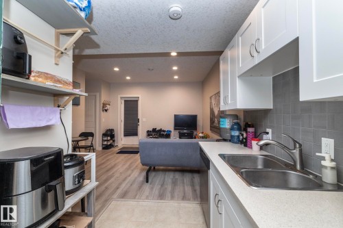 5315 17 Avenue, Edmonton, AB - Indoor Photo Showing Kitchen With Double Sink