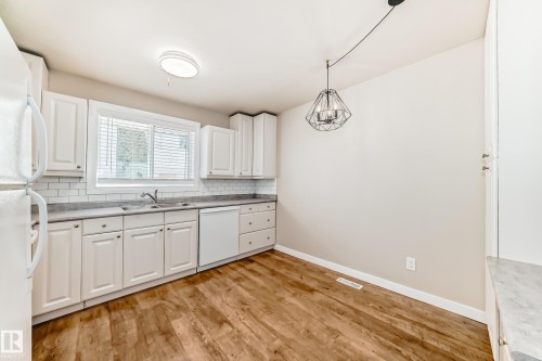 6 Woodvale Village, Edmonton, AB - Indoor Photo Showing Kitchen With Double Sink
