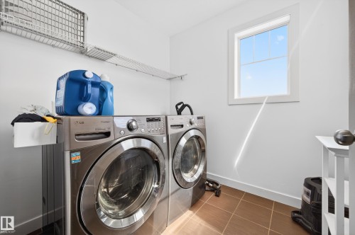 1004 Secord Promenade, Edmonton, AB - Indoor Photo Showing Laundry Room