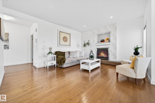 1004 Secord Promenade, Edmonton, AB - Indoor Photo Showing Living Room With Fireplace