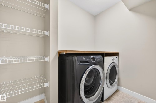 1004 Secord Promenade, Edmonton, AB - Indoor Photo Showing Laundry Room