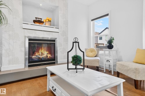 1004 Secord Promenade, Edmonton, AB - Indoor Photo Showing Living Room With Fireplace