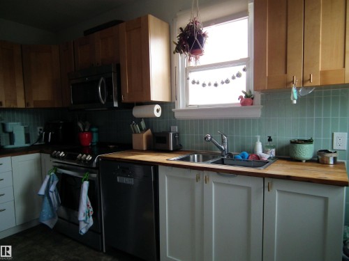 11702 79 Street Nw, Edmonton, AB - Indoor Photo Showing Kitchen With Double Sink