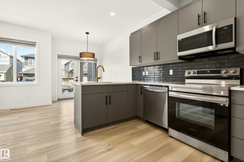 Unit 9 1910 Collip View, Edmonton, AB - Indoor Photo Showing Kitchen With Upgraded Kitchen