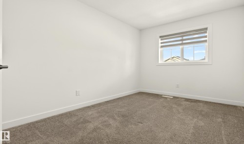 Unit 9 1910 Collip View, Edmonton, AB - Indoor Photo Showing Other Room