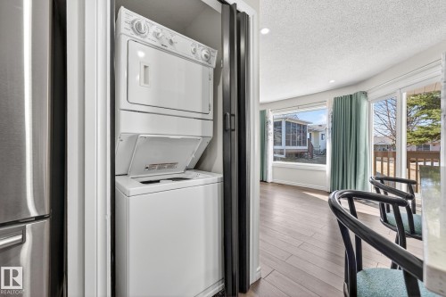 Main Floor Laundry in Kitchen - 30 903 109 Street, Edmonton, AB - Indoor Photo Showing Laundry Room
