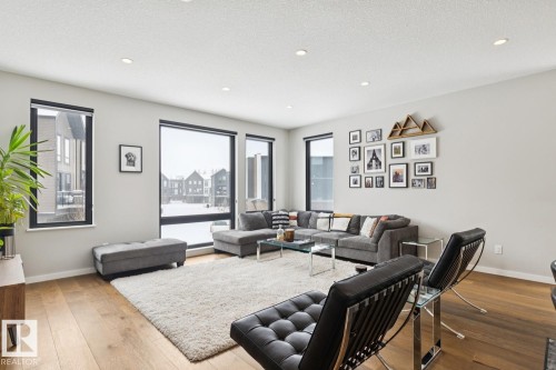 9 1304 Rutherford Road, Edmonton, AB - Indoor Photo Showing Living Room