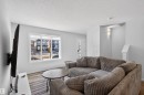 2422 Trumpeter Way, Edmonton, AB  - Indoor Photo Showing Living Room 