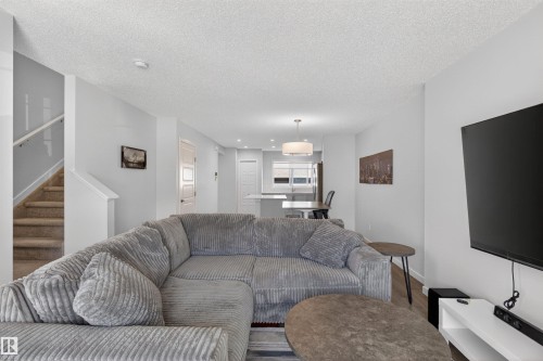 2422 Trumpeter Way, Edmonton, AB - Indoor Photo Showing Living Room