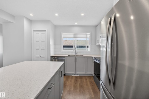 2422 Trumpeter Way, Edmonton, AB - Indoor Photo Showing Kitchen With Double Sink With Upgraded Kitchen