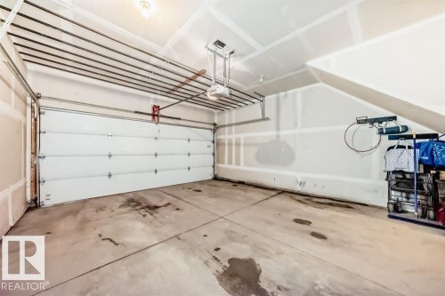 3346 15A Avenue, Edmonton, AB - Indoor Photo Showing Garage