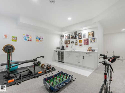7215 May Road, Edmonton, AB - Indoor Photo Showing Gym Room