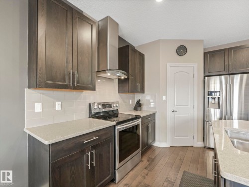 16412 12 Avenue, Edmonton, AB - Indoor Photo Showing Kitchen With Double Sink