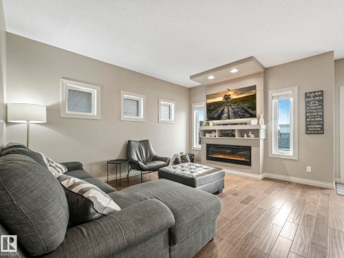 16412 12 Avenue, Edmonton, AB - Indoor Photo Showing Living Room With Fireplace