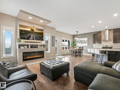 16412 12 Avenue, Edmonton, AB - Indoor Photo Showing Living Room With Fireplace
