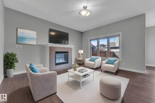 642 Adams Way, Edmonton, AB - Indoor Photo Showing Living Room With Fireplace