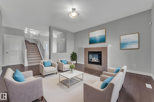 642 Adams Way, Edmonton, AB - Indoor Photo Showing Living Room With Fireplace