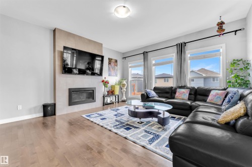 4104 6 Avenue, Edmonton, AB - Indoor Photo Showing Living Room With Fireplace