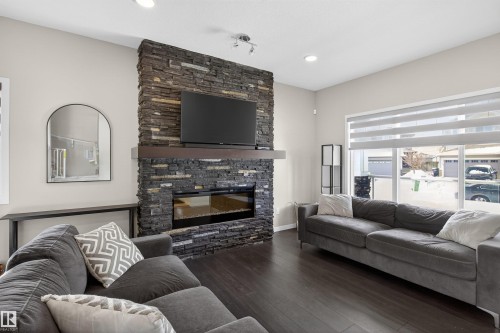 17311 49 Street, Edmonton, AB - Indoor Photo Showing Living Room With Fireplace
