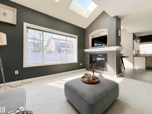 1007 Goodwin Crest, Edmonton, AB - Indoor Photo Showing Living Room With Fireplace