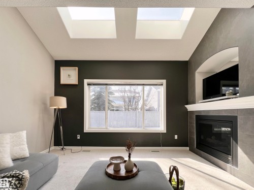 1007 Goodwin Crest, Edmonton, AB - Indoor Photo Showing Living Room With Fireplace