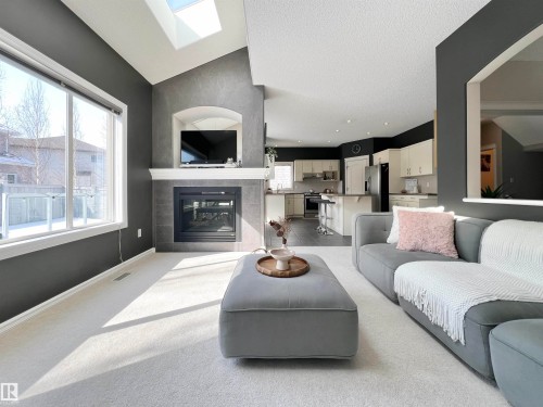 1007 Goodwin Crest, Edmonton, AB - Indoor Photo Showing Living Room With Fireplace