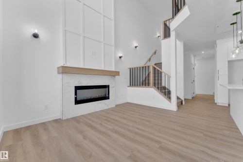 3610 40 Avenue, Beaumont, AB - Indoor Photo Showing Living Room With Fireplace