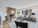 14736 122 Street, Edmonton, AB  - Indoor Photo Showing Living Room With Fireplace 